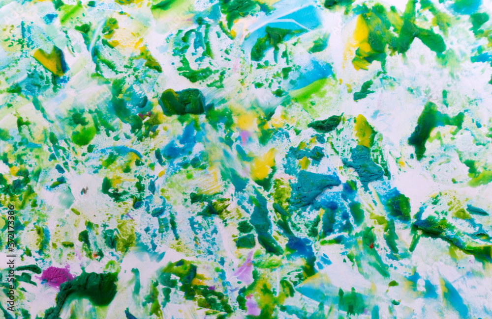 Blue and green decorative rough plaster texture on white background. Close up wall grunge artwork texture.
