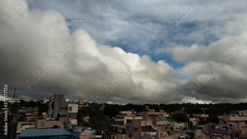 Time lapse video motion of moving clouds with blue sky color.