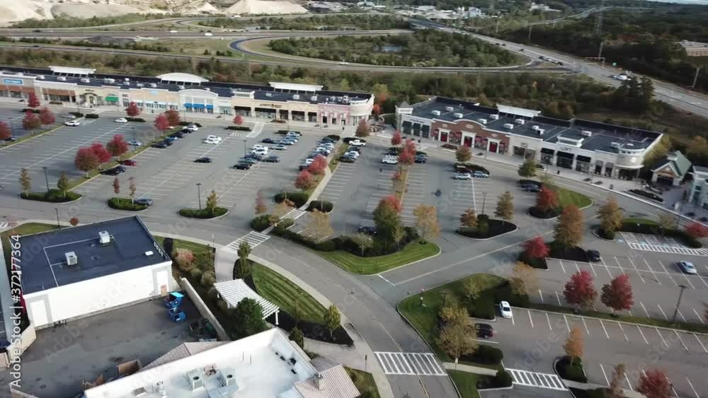 drone shot circling around an outdoor mall