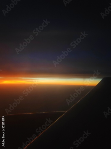 sunset over the clouds © Dishant