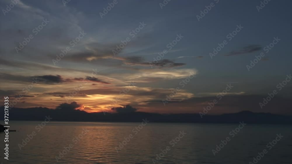 Amazing sunset over sea on background of heavy clouds and a amazing coastline and skyline on islands of Republic of Philippines. Amazing sunset over sea on background of heavy clouds and a amazing coastline and skyline on islands of Republic of Philippines.