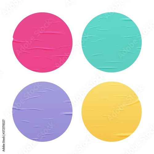 Glued color round stickers set isolated on white background. Vector realistic crumpled posters bundle. Empty advertising circles mockup for creative design.
