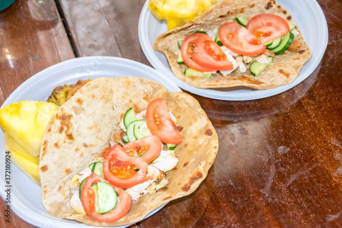 healthy breakfast vegetables and meat on a tortilla