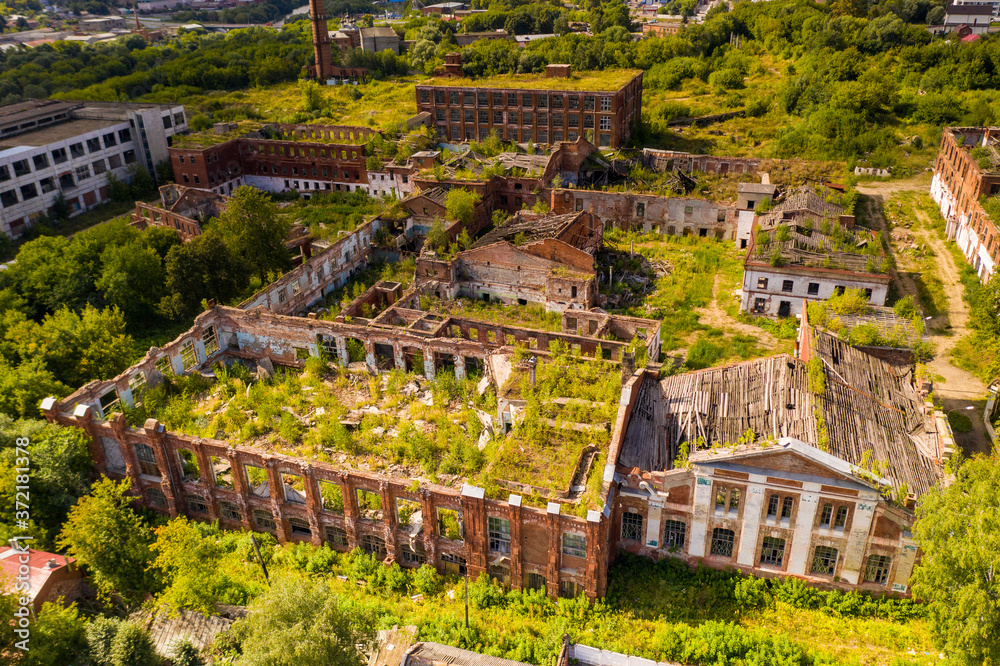 panoramic view of the ruins of an old abandoned red brick factory