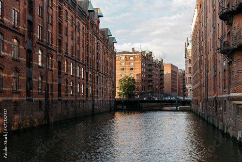 The Warehouse District or Speicherstadt in Hamburg. Wandrahmsfleet canal photo