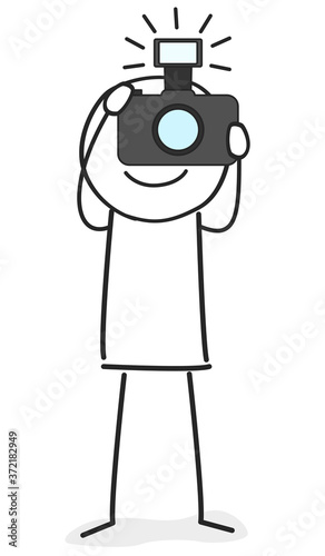 Fotograf hält Kamera in der Hand und macht ein Foto