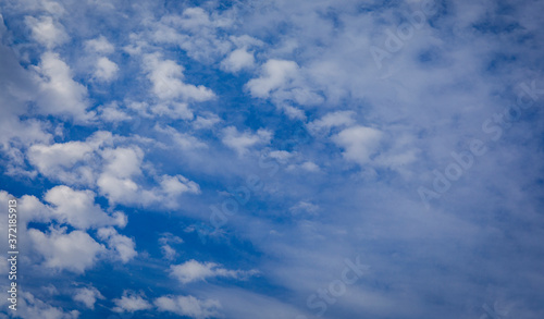 The vast blue sky and clouds sky. Luxury blue sky background with tiny clouds.