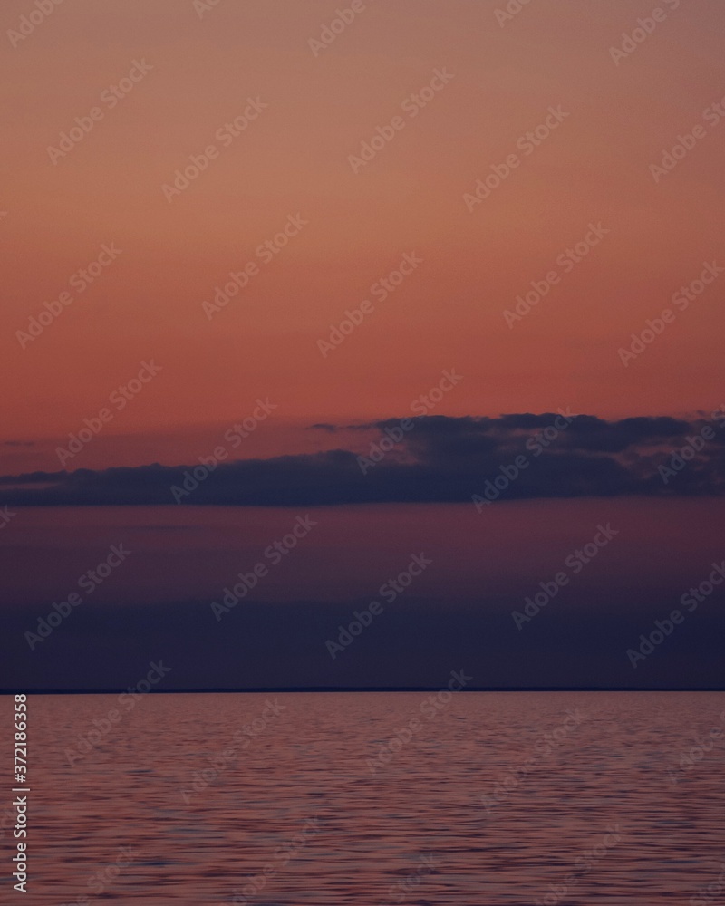 sunset over the sea, orange sunset and sky, wonderful landscape, evening atmosphere 