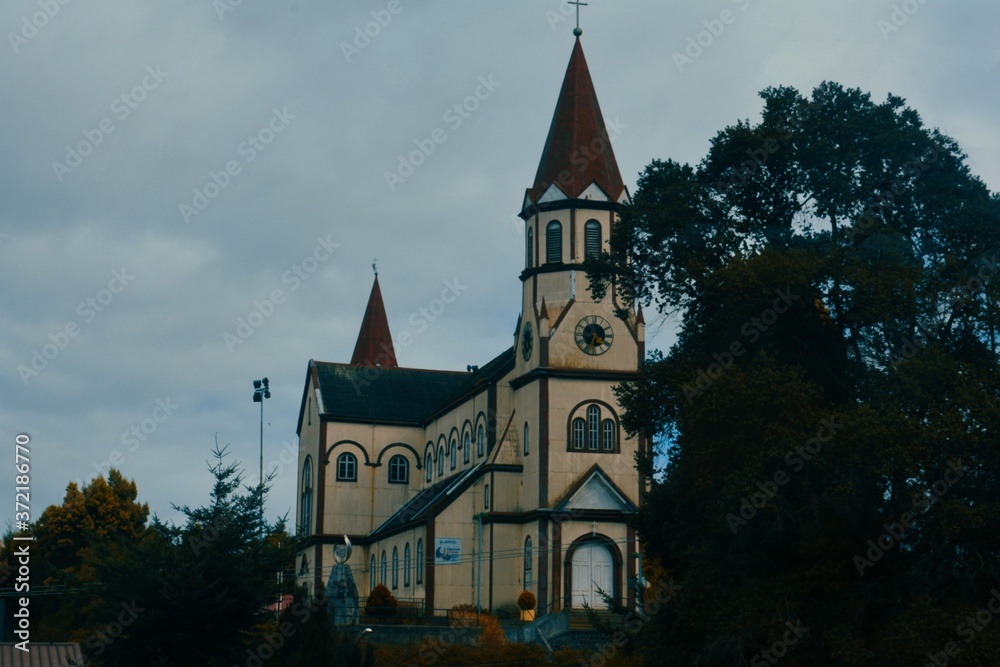 well-kep colonial church of Puerto Varas, under a cloudy sky in cold winter well-kep colonial church of Puerto Varas, under a cloudy sky in cold winter