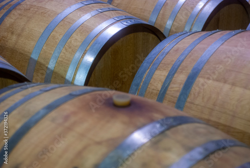 Cellar with many barriques for the aging of red wine