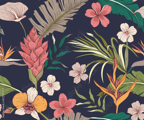Seamless pattern. Tropical flowers and leaves. Dark background. Trendy colors