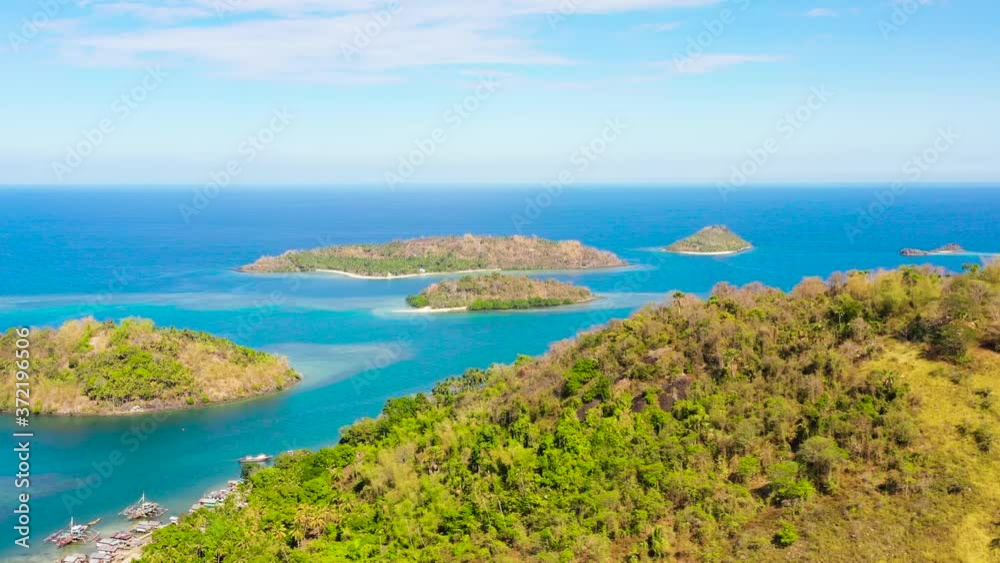 Seascape with Islands and blue sea. Sallangan Islands, Simoadang Island. Mindanao, Philippines.