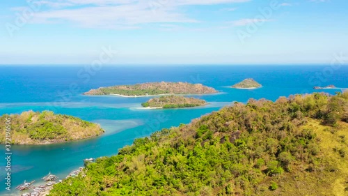 Seascape with Islands and blue sea. Sallangan Islands, Simoadang Island. Mindanao, Philippines. photo