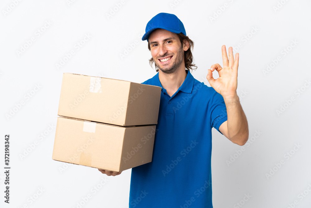 Delivery man isolated on white background showing ok sign with fingers Delivery man isolated on white background showing ok sign with fingers