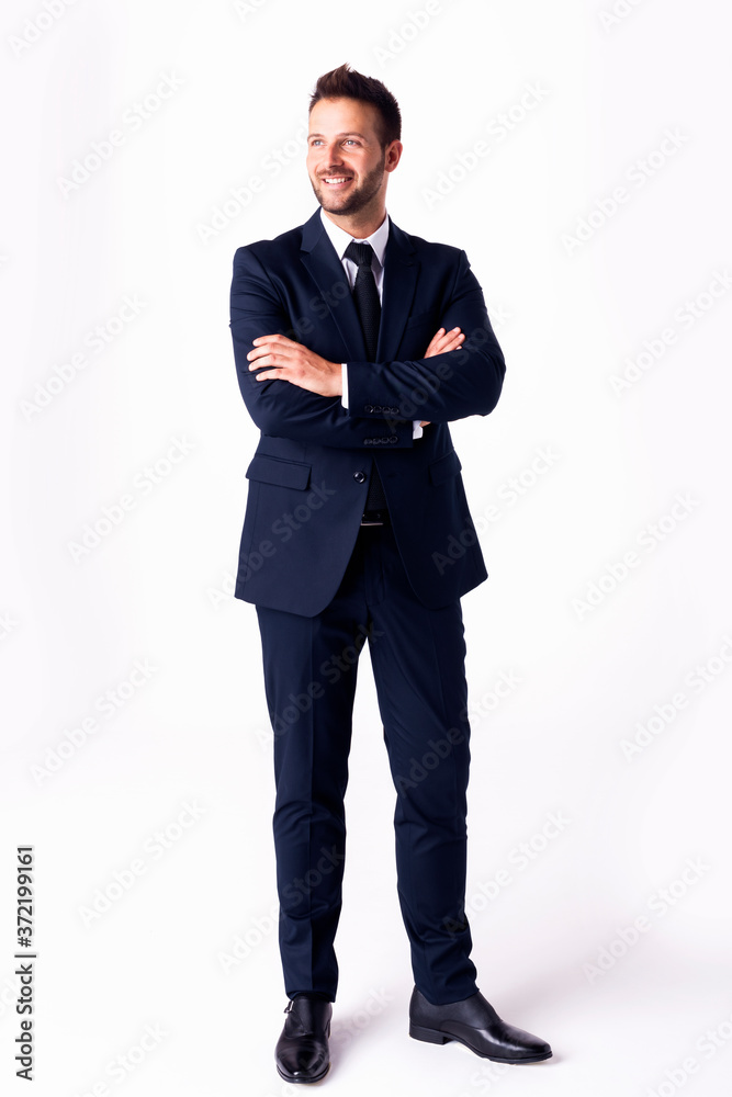 Full length shot executive businessman on white background. Studio shot Full length shot executive businessman on white background. Studio shot