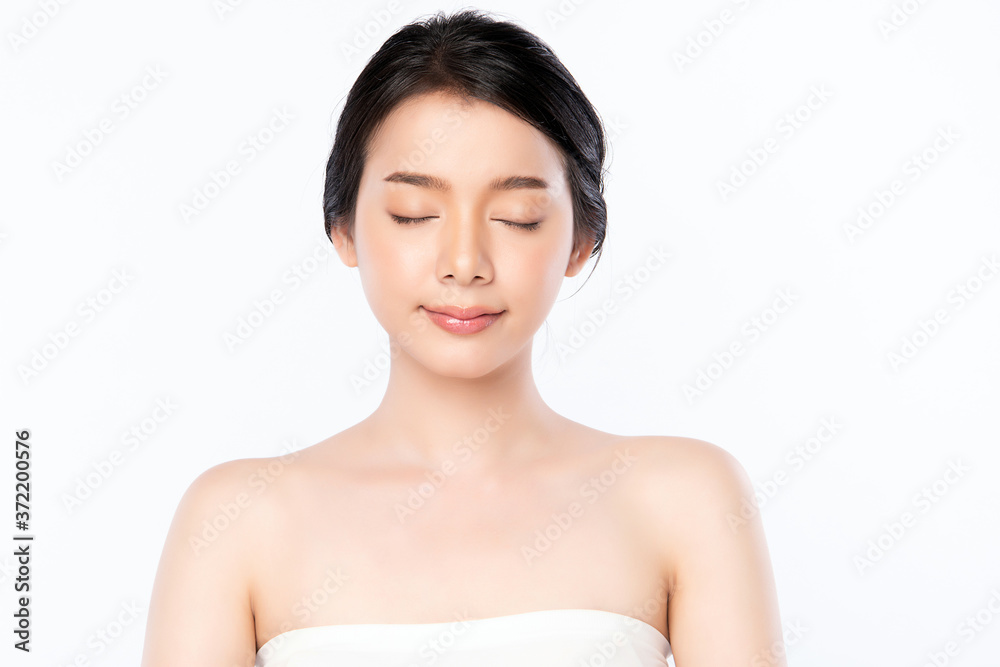Beautiful Young asian Woman with Clean Fresh Skin, on white background, Face care, Facial treatment, Cosmetology, beauty and spa, Asian women portrait Beautiful Young asian Woman with Clean Fresh Skin, on white background, Face care, Facial treatment, Cosmetology, beauty and spa, Asian women portrait