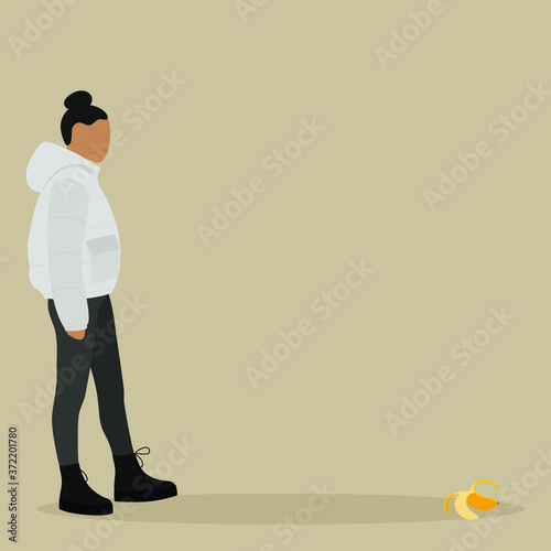 A female character in a jacket is walking, and on the floor is a banana peel