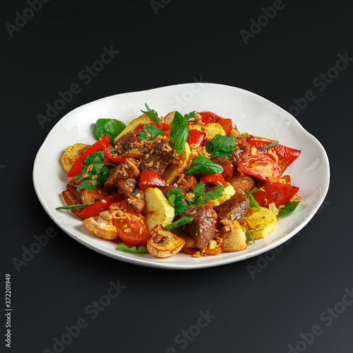 Dishes of traditional Russian cuisine. Restaurant serving. Black background.