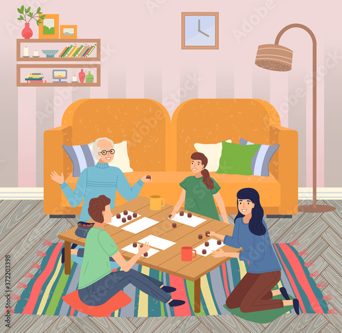 Family spend leisure time together at home, happy people playing bingo lotto game at table, mother, daughter, father, grandfather, indoors home activity, hobby, parents and kids relationships