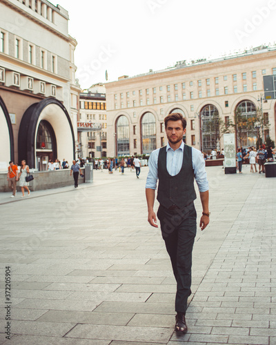 businessman working walking around the city