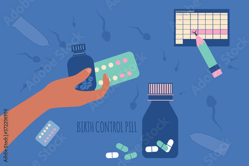 Birth control pill and condoms concept.World contraception day. Prevention HIV and AIDS.Spermatozoa swim around.Human hand holding medicine jars, tablets in Blister Packs. Planning the menstrual cycle