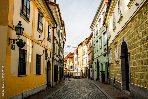 Fototapeta Naklejka Na Ścianę i Meble -  Narrow street of Old European City