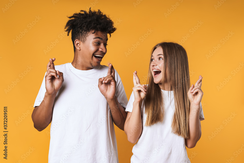 Happy young multiethnic couple standing Happy young multiethnic couple standing