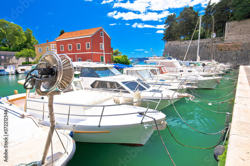Zadar. Historic Fosa harbor bay in Zadar boats and architecture colorful view photo