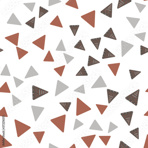 Seamless decorative pattern of triangles. Colorful abstract background. Soft light texture. Geometry style print for web, textile, wallpaper, stationery.