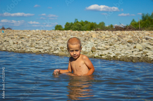  boy bathes in a mountain river © Катерина Іванюк