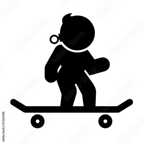 baby riding on a skateboard