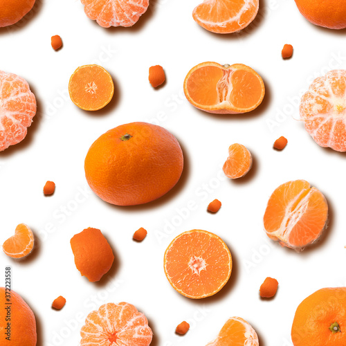 Fruit seamless pattern of mandarin on yellow background. Tangerine. top view.