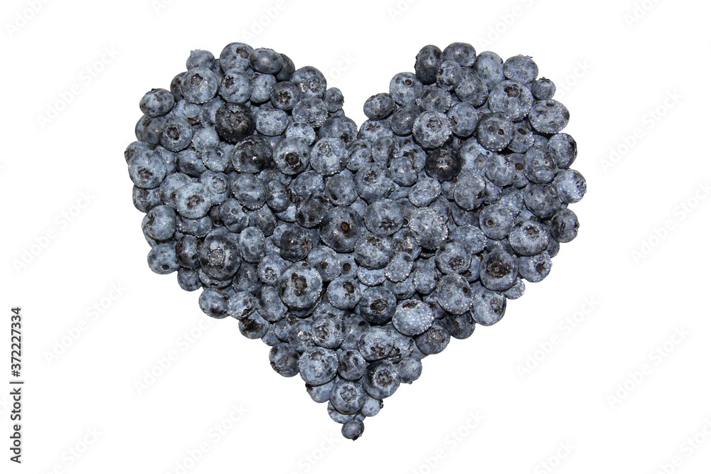 Blueberry heart with drops. Isolated on white background. Healthy and dietary food Blueberry heart with drops. Isolated on white background. Healthy and dietary food