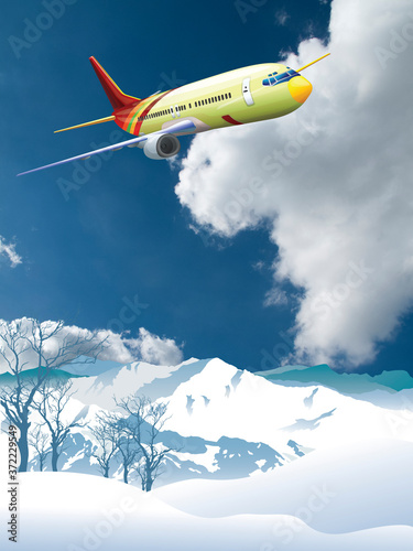 Passenger airplane flying over snowcapped mountain range set against a blue cloudy sky