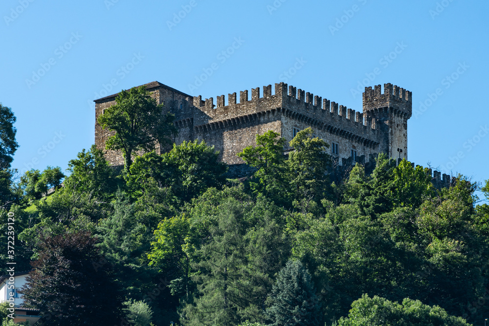 Exterior view of Corbaro Sasso aka Unterwalden or Santa Barbara medieval castle and blue sky in Bellinzona Switzerland