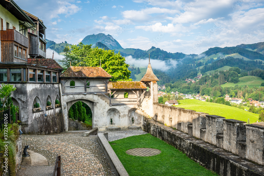 Fortification and entrance of the medieval village of Gruyeres in La Gruyere Switzerland