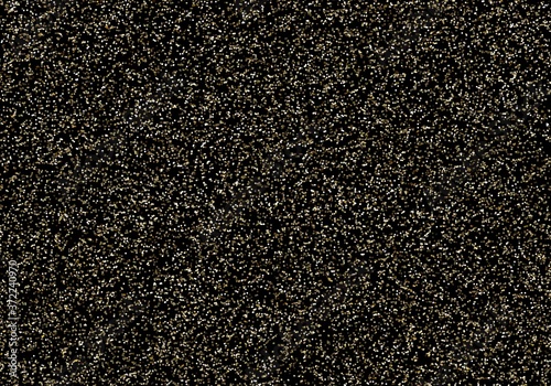 Small glitter golden pattern on black background isolated.