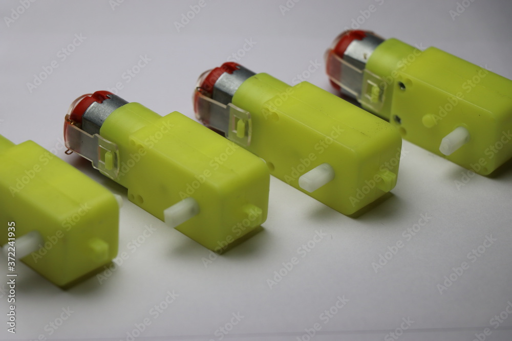 Obraz premium Double shaft Geared DC motor which is used in making electronic projects which has high torque on white background