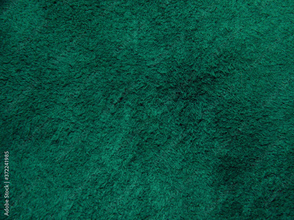 Background of dark purple suede fabric closeup Background of dark purple suede fabric closeup