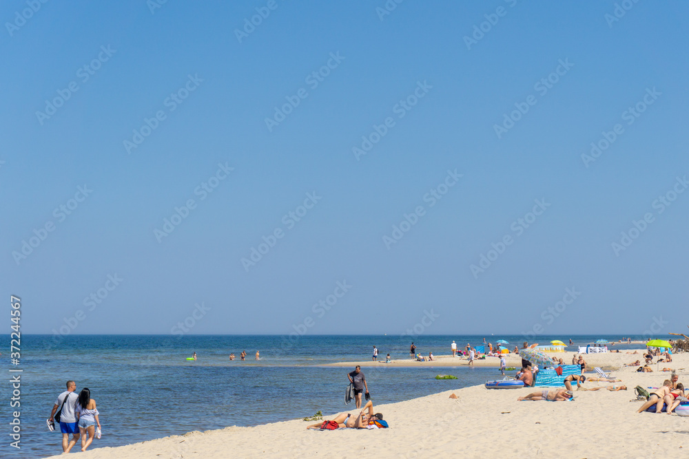people enjoy a day on the beach in Wolinski National Park on the Baltic Sea