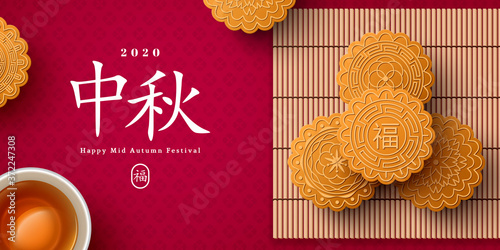 Mooncake on bamboo mat and teacup, Chinese translation is blessing and Mid Autumn. Top view of tea ceremony with cookies, China holiday poster design.