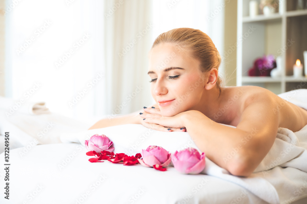 Health care and thai massage. Beautiful woman smile and relax in spa salon Health care and thai massage. Beautiful woman smile and relax in spa salon