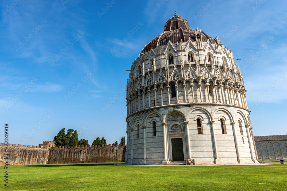 Pisa Baptistery (Battistero di San Giovanni) in Romanesque Gothic style, Piazza or Campo dei Miracoli (Square of Miracles). Tuscany, Italy, Europe