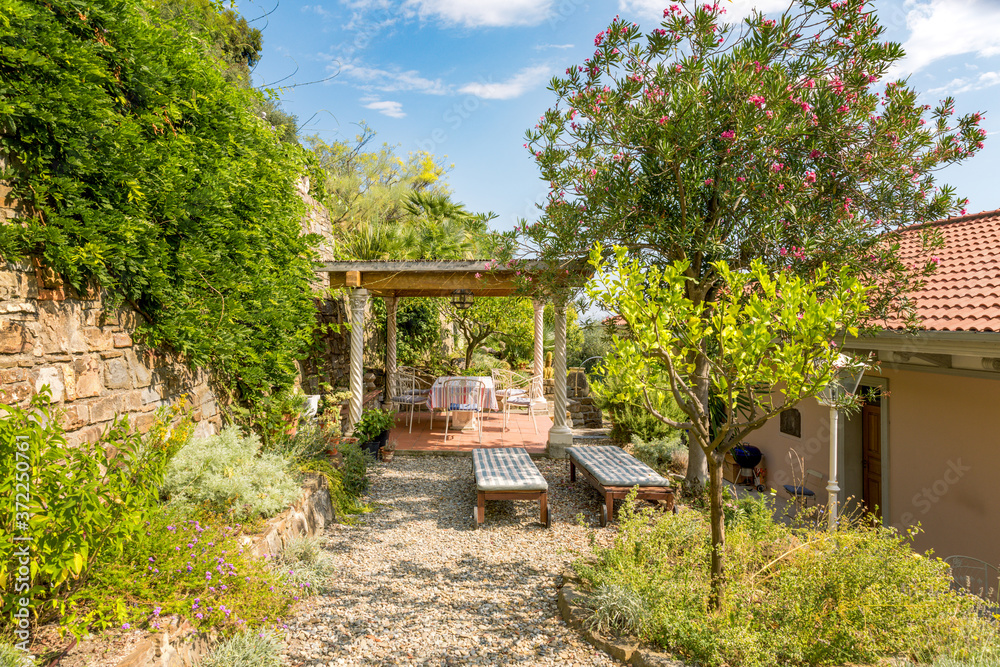 Colors and ambiance of a Mediterranean garden in Sanremo, Liguria, Italy Colors and ambiance of a Mediterranean garden in Sanremo, Liguria, Italy