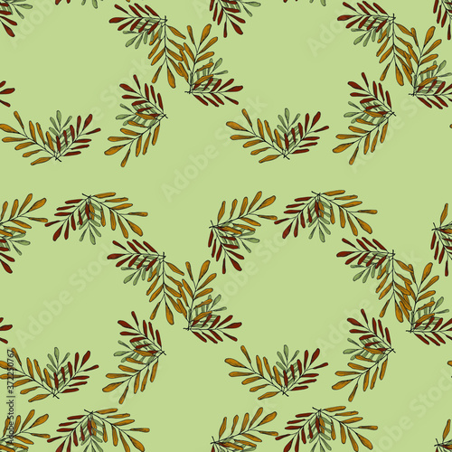 swirl of autumn branches with leaves on a warm green background,seamless pattern with leaves
