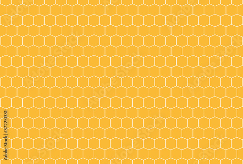 Honeycomb yellow pattern. Vector honeycomb pattern. Yellow geometric pattern. 