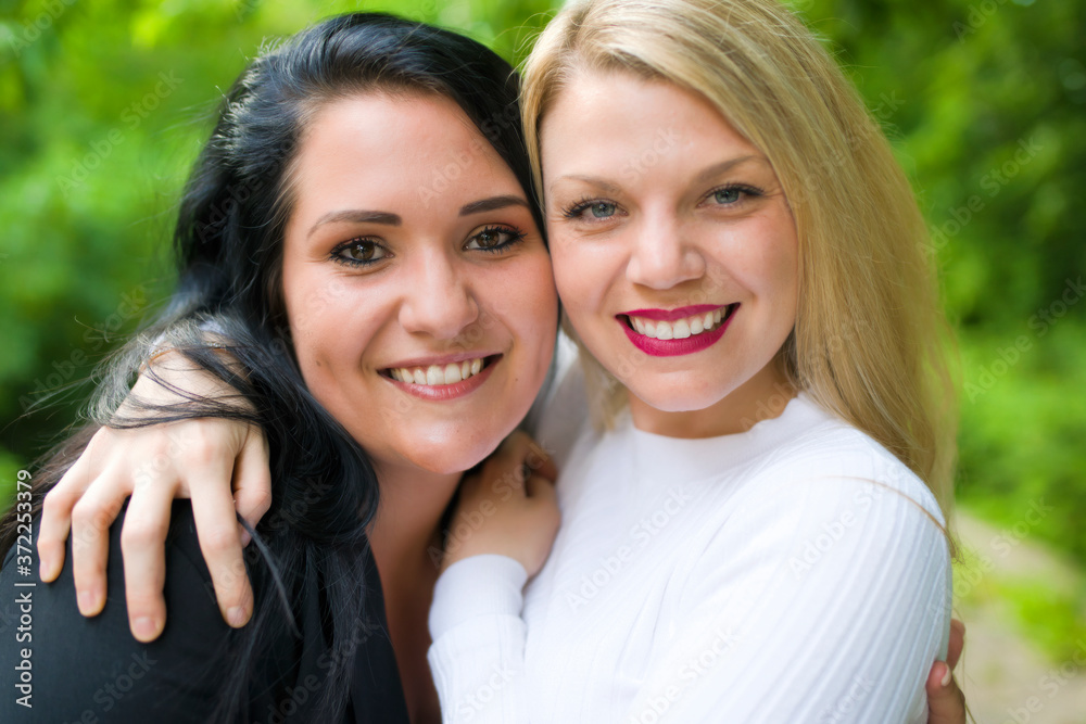 Two happy beautiful girls having fun outdoor Two happy beautiful girls having fun outdoor