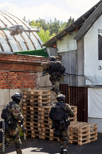 Special forces soldiers storm the walls