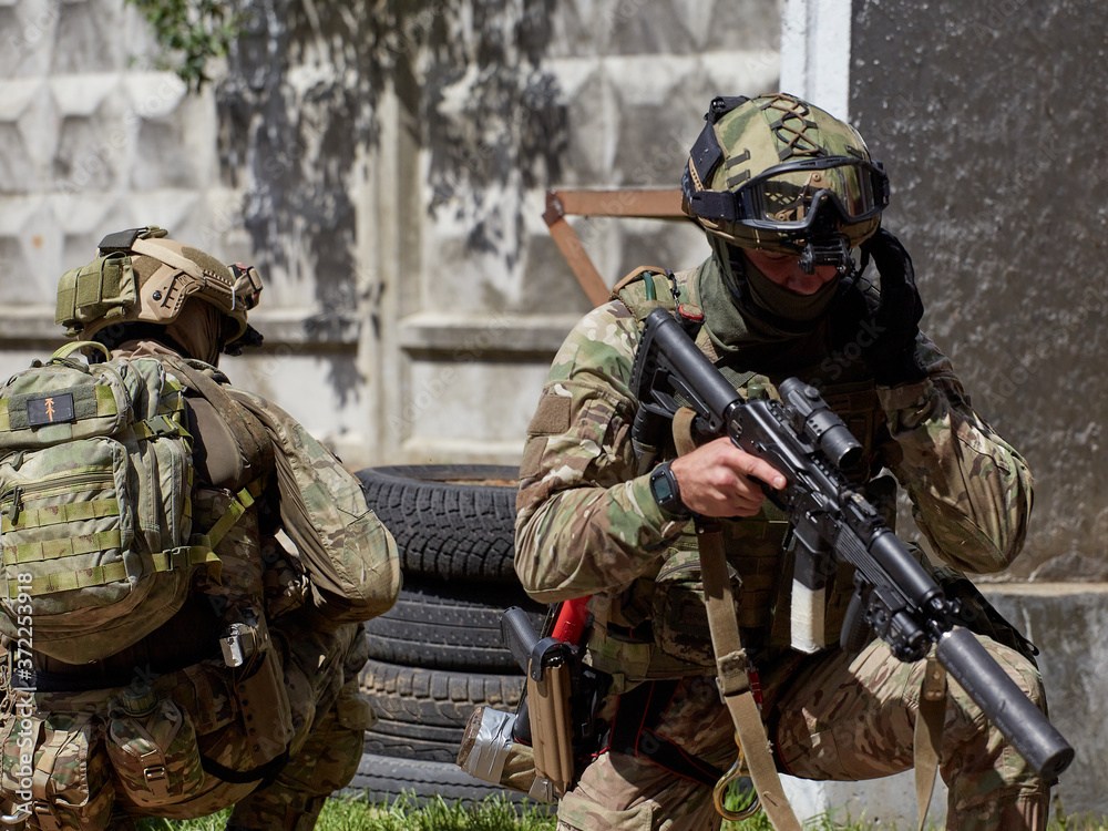Special forces soldiers take up the defense