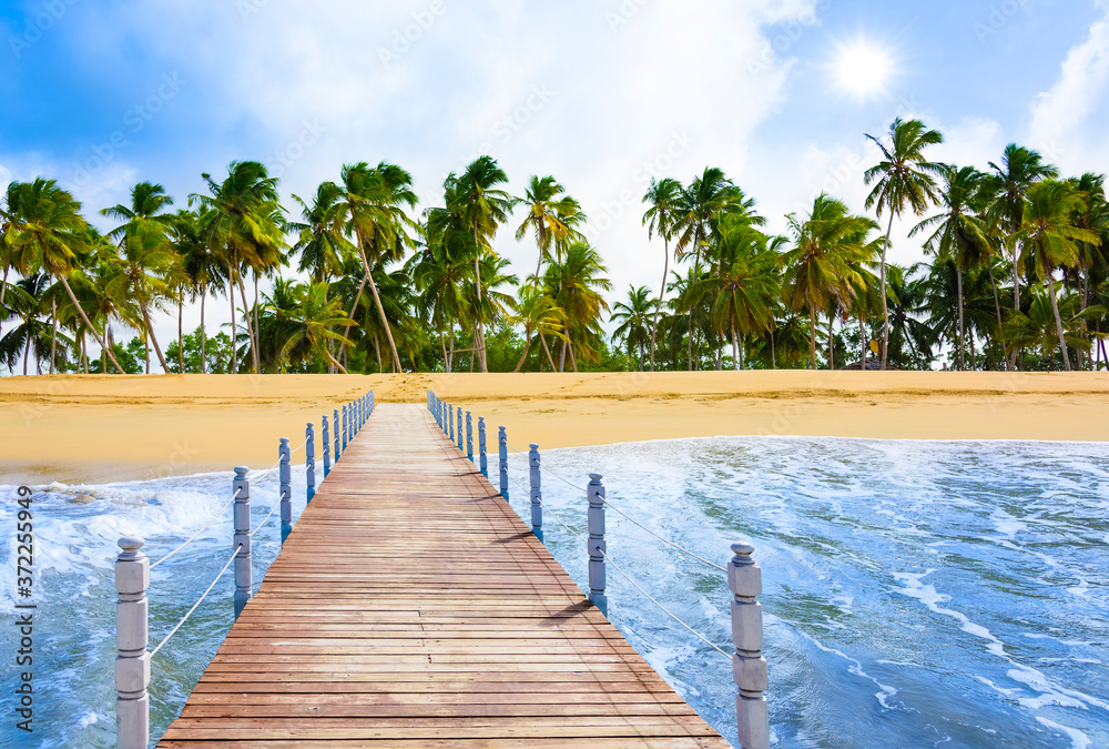 wooden bridge juts out into  of the sea